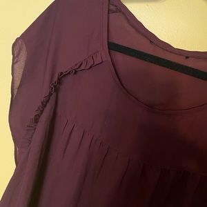 Light weight dress top! Super cute with jeans.  Nice little ruffle detail.